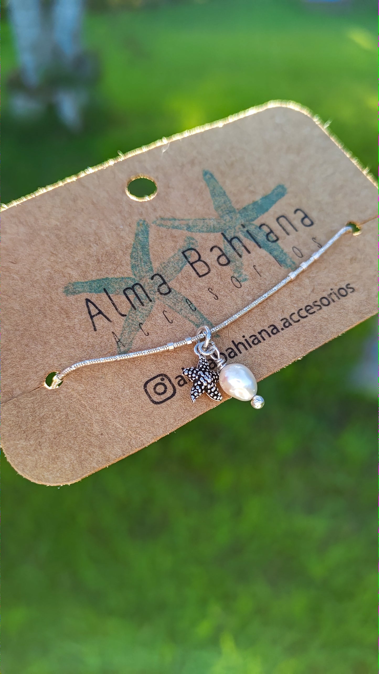 Pulsera estrellita de mar con perla de rio
