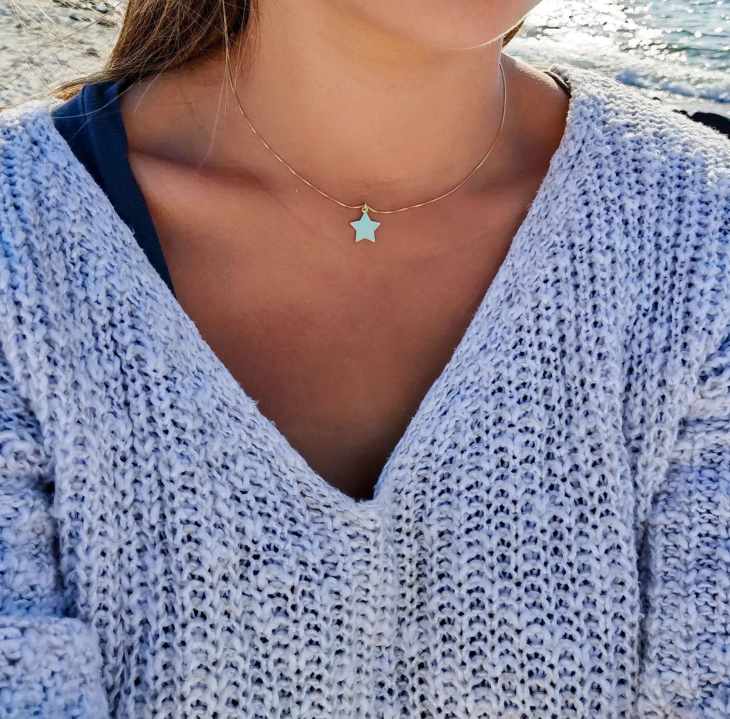 Collar estrella dorada